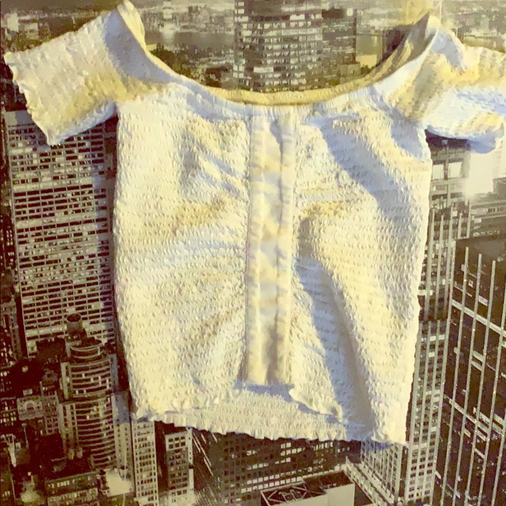 White cropped off the shoulder